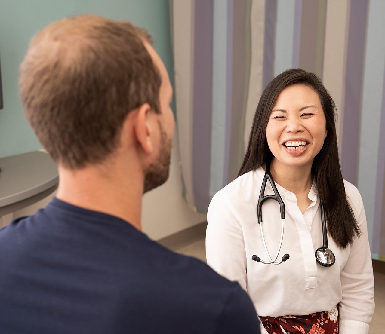 Image displaying doctor laughing